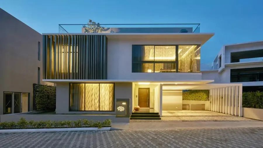 Contemporary villa exterior at dusk