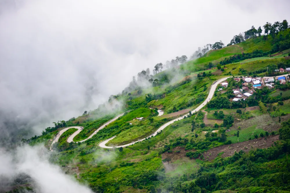 Mist rolling over the green hills around Ooty
